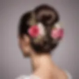 Elegant double bun hairstyle with floral accessories