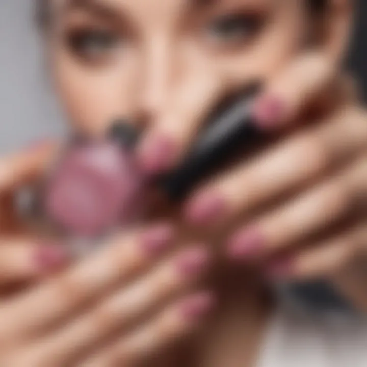 An elegant hand holding a gel nail polish bottle.