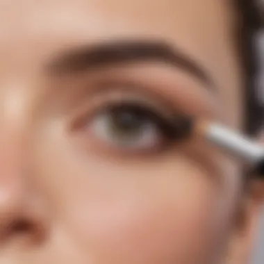 Close-up of eyebrow pencil application.