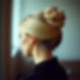 Elegant tight bun hairstyle on a model