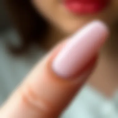 A close-up of a beautifully manicured long nail